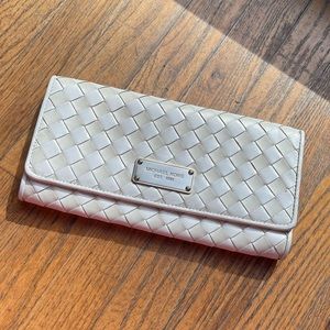 Michael Kors cream braided clutch